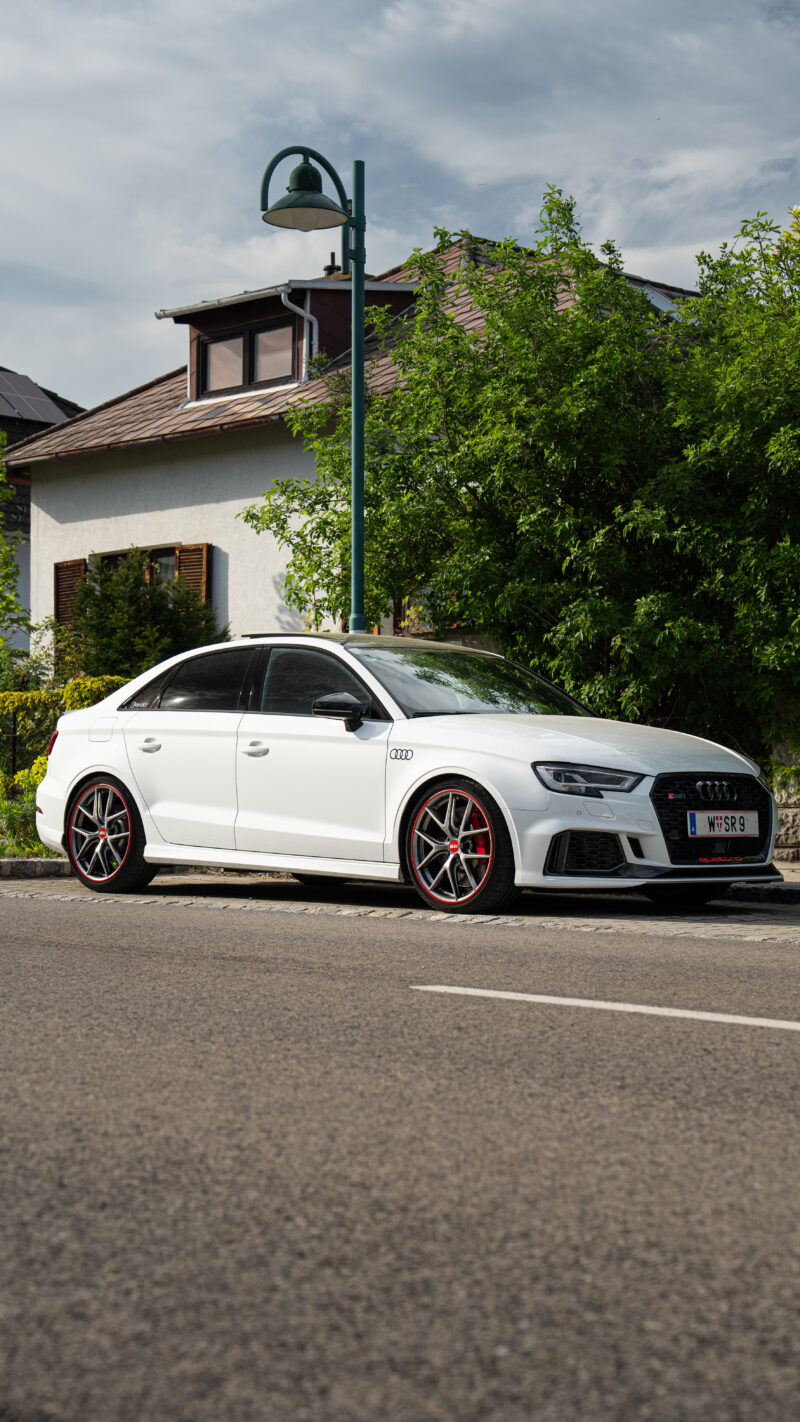 Audi RS3 side view photographed with clean angles and strong automotive presence